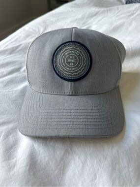 Travis Mathew Gray Trucker Hat with Round Patch
